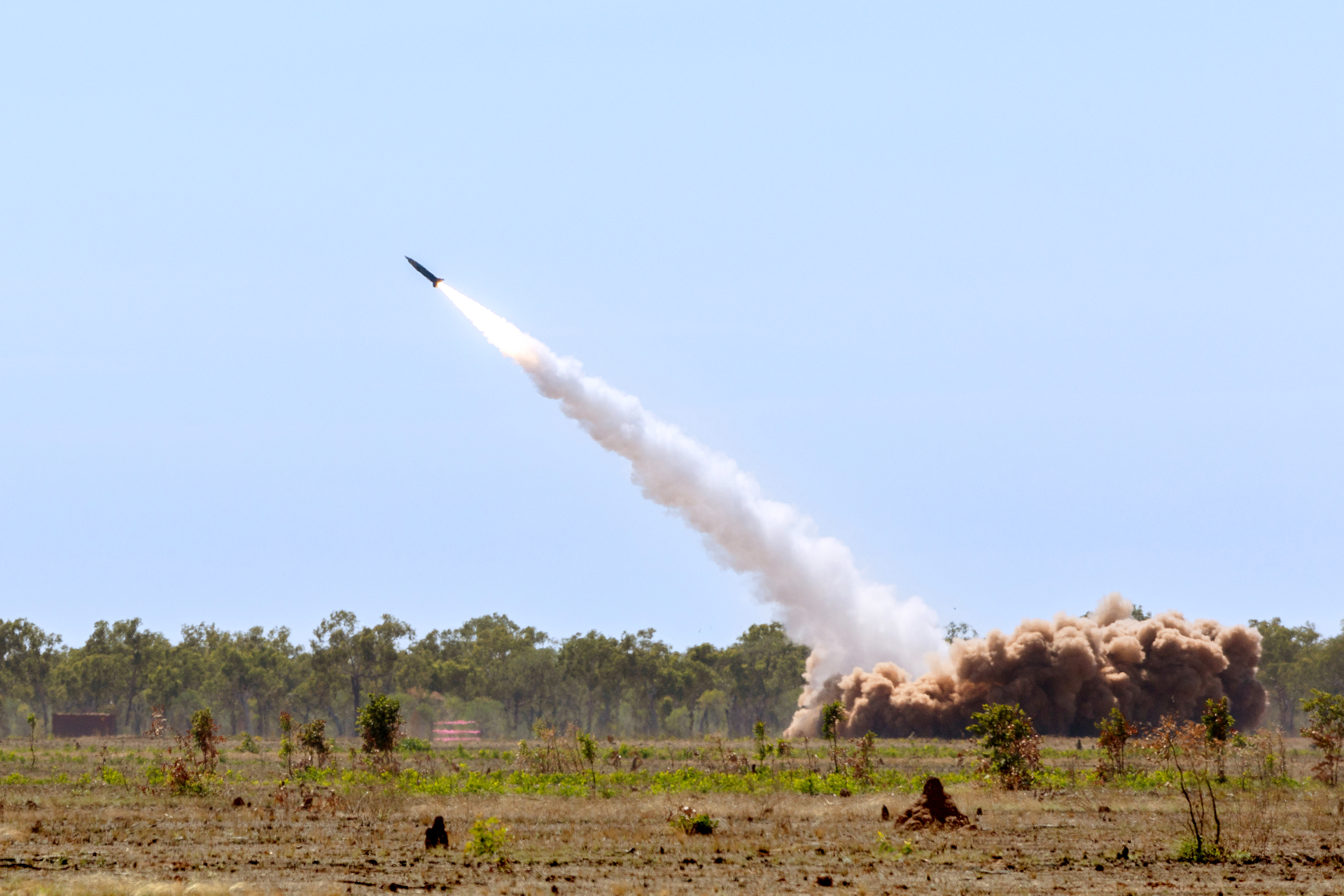 A United States Army M142 High Mobility Artillery Rocket System (HIMARS) fires a MGM-140 Army Tactical Missile System (ATACMS) at Delamere Air Weapons Range, Northern Territory.