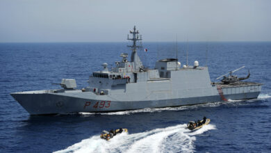 An Italian Navy visit, board, search and seizure team returns to the Italian Navy offshore patrol vessel ITS Comandante Foscari after completing inspections aboard the Military Sealift Command container and roll-on/roll-off ship USNS LCPL Roy H. Wheat during the at sea portion of exercise Phoenix Express 2010. PE-10 is a two-week exercise designed to strengthen maritime partnership and enhance stability in the region through increased interoperability and cooperation among partners from Africa, Europe and United States.