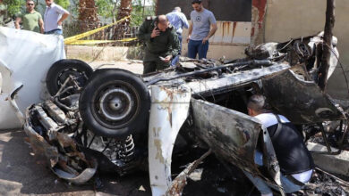 Syrian investigators at the site of an explosion in Damascus on May 10, 2023