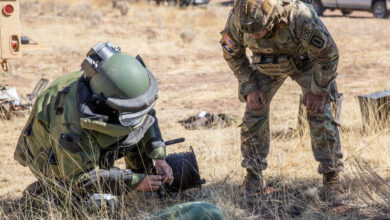 Staff Sgt. Billy McCoy (Left) and Sgt. Micah Miller (right), explosive ordnance disposal (EOD) technicians assigned to 722nd Ordnance Company Airborne (EOD), 192nd Ordnance Battalion (EOD) based out of Fort Bragg, North Carolina, set up electronic demolition in preparation for render safe procedures (RSP) during the EOD Team of the Year (ToY) competition 15-19 May on Fort Carson, Colorado. The Team of the Year competition is where explosive ordnance disposal technicians face off in challenging scenarios and are assessed on fitness, technical and tactical skills and response capabilities. (U.S. Army photo by Sgt. Sharifa Newton)