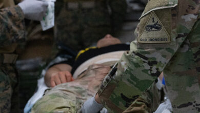 U.S. Army combat medics assigned to 4th Battalion, 70th Armor Regiment, 1st Armored Brigade Combat Team, 1st Armored Division, and U.S. Navy corpsmen assigned to 3rd Medical Battalion, 3rd Marine Logistics Group, engage in a rigorous cross-training exercise during Pacific Fortitude at Rodriguez Live Fire Complex, South Korea, August 13, 2024. Pacific Fortitude supports long-standing agreements to the Republic of Korea by deploying forces, drawing and supporting equipment to validate unit readiness and the U.S. commitment to the ROK-US alliance. (U.S. Army photo by Spc. Hunter Grice)