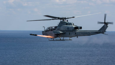 AH-1Z Viper attack helicopter fires a Hellfire missile