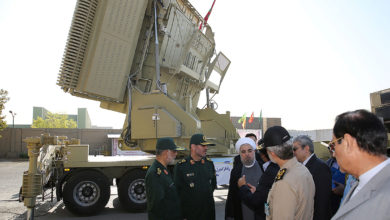 Iran's President Hassan Rouhani with the Bavar-373 air defense missile system