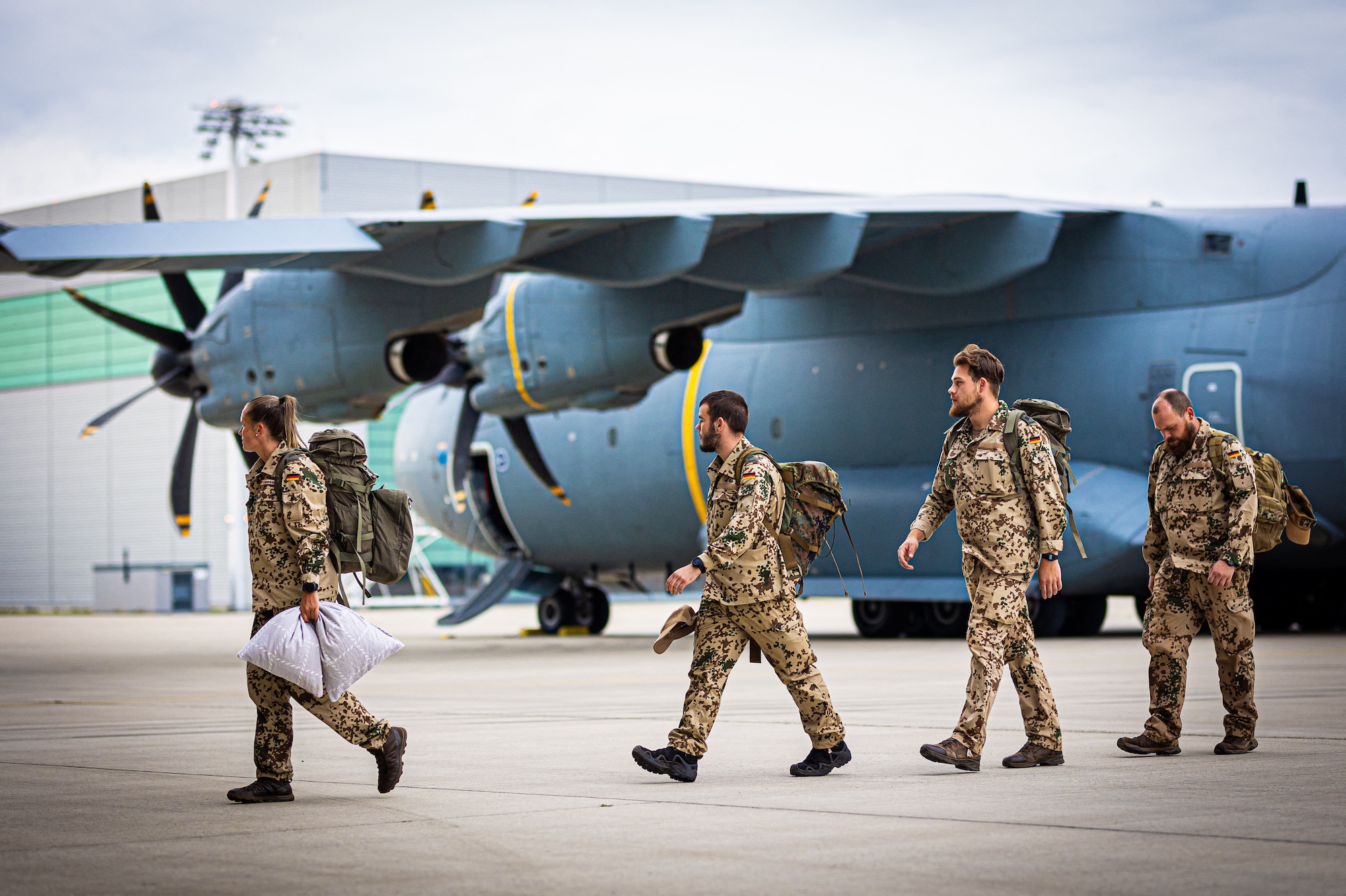 Bundeswehr soldiers leave an Airbus A400M transport aircraft of the German Air Force after Germany ended its mission in Niger