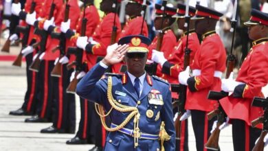 Kenya's defense chief General Francis Omondi Ogolla gestures