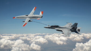 The Boeing MQ-25 T1 test asset transfers fuel to a US Navy F/A-18 Super Hornet on June 4, marking the first time in history that an unmanned aircraft has refueled another aircraft.