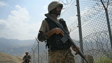 Pakistani troops patrol along the Afghanistan border at Big Ben post in Khyber district in Khyber Pakhtunkhwa province