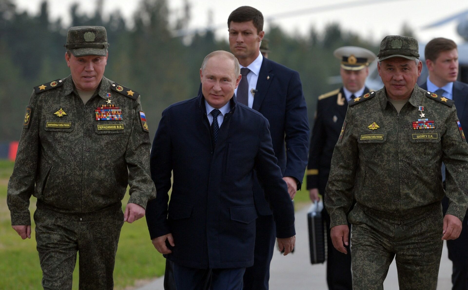 Putin and military officials