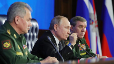 Russian President Vladimir Putin with Defense Minister Sergei Shoigu