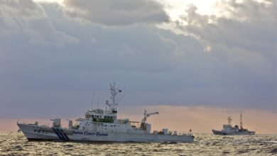 Japanese Coast Guard Cutters stand watch over the Senkaku islands/Diaoyu islands in 2012.