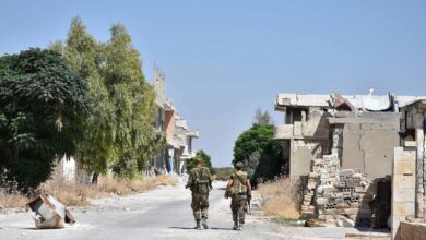 Syrian soldiers in the northern countryside of Hama province in central Syria