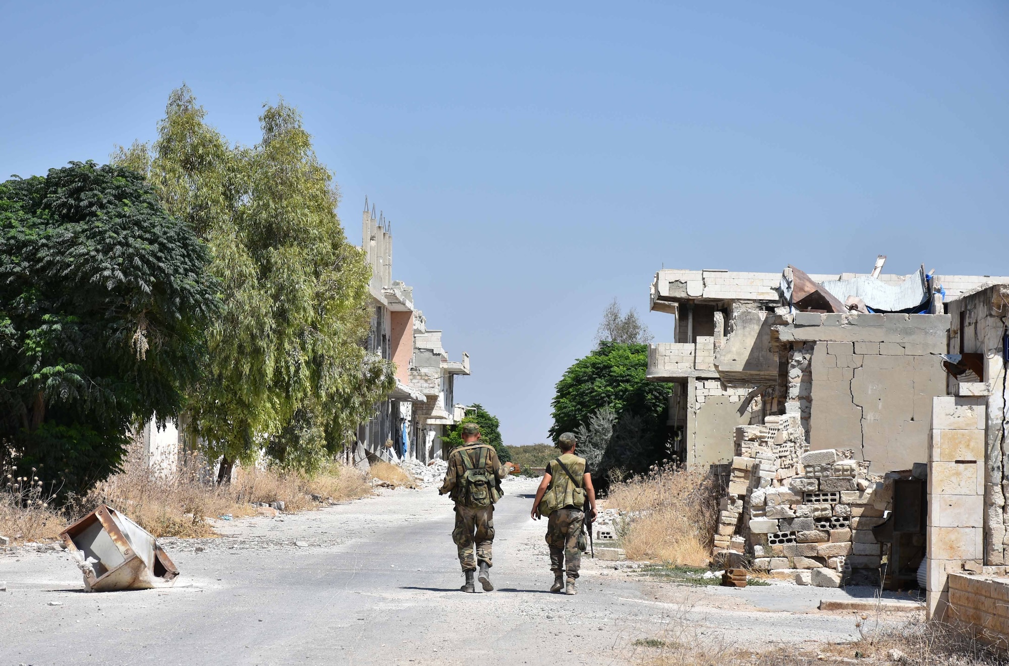 Syrian soldiers in the northern countryside of Hama province in central Syria