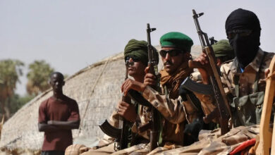 Malian tuareg soldiers patrol in the streets of Gao