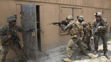 US Marines practice entering buildings during a military operations on urban terrain exercise at Marine Corps Base Camp Lejeune, 2015