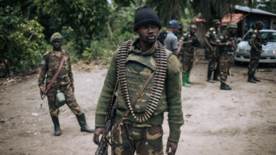 A Democratic Republic of Congo soldier is seen on patrol in the village of Manzalaho, near Beni, Feb. 18, 2020, following an alleged attack by members of the Allied Democratic Forces (ADF) rebel group.