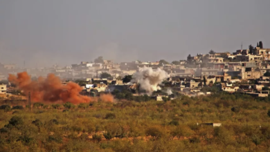 Smoke plumes rise from buildings in the village of Kansafra, in the southern countryside of Syria's rebel-held northwestern Idlib province, on October 23, 2020.